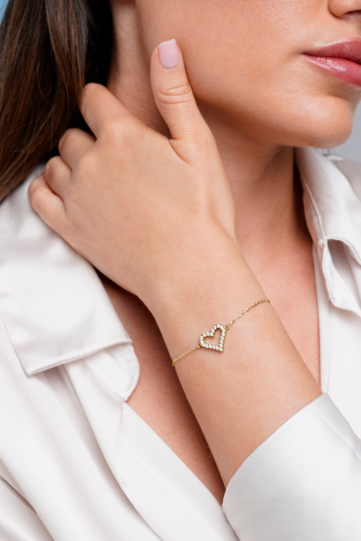 PULSERA CORAZÓN CENTRAL EN PLATA BAÑADA EN ORO