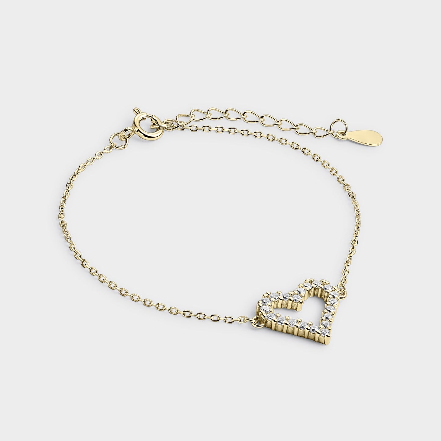 PULSERA PLATA BAÑADA EN ORO AMARILLO DE ESLABONES OVALADOS PEQUEÑOS CON SILUETA DE CORAZON CON CIRCONITAS BLANCAS