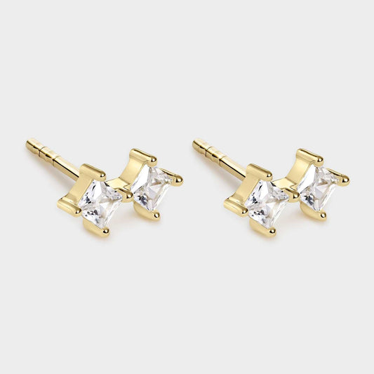 Gold rhombus earrings with white zircons